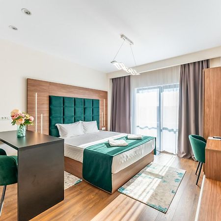 M City Aparthotel Arad Habitación foto